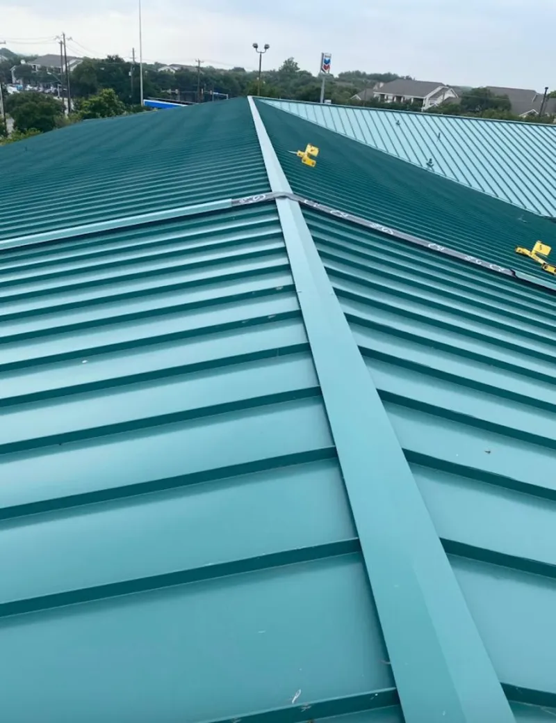 Green commercial metal roof ridge and valley for Metal Roof Repair in Bristol